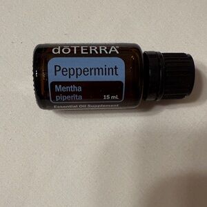 doTERRA Peppermint Essential Oil 15mL - Brown and Black